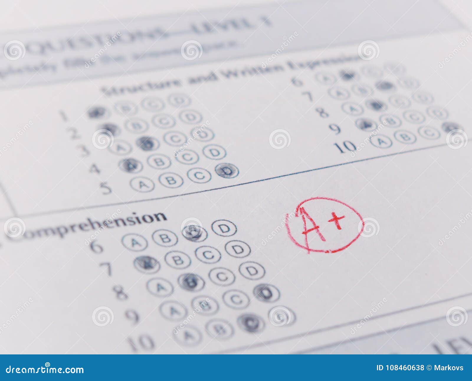 close-up photograph of a perfect grade on a scantron test