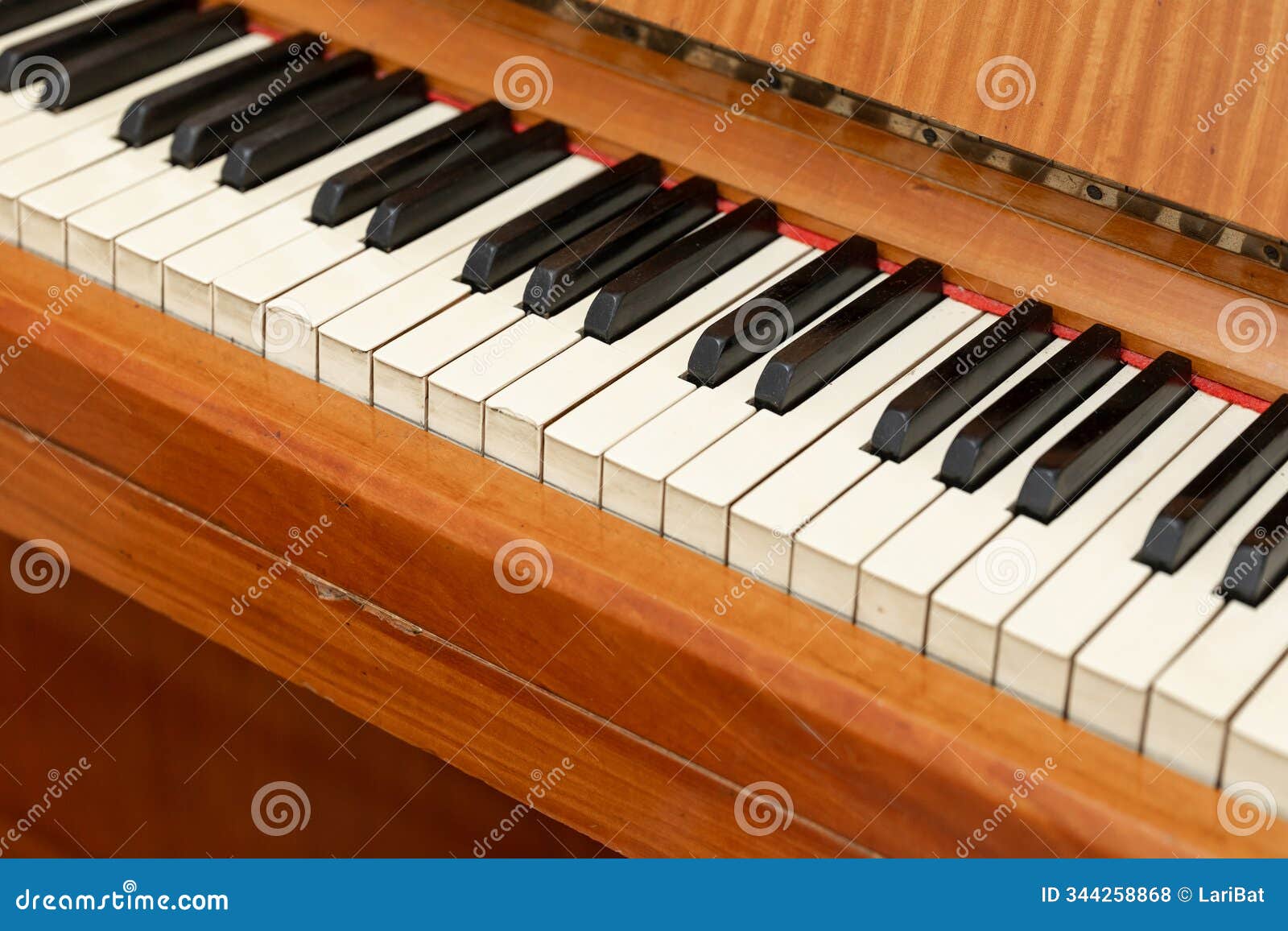 close-up of piano keyboard, capturing the black and white keys in their timeless elegance. piano fragment