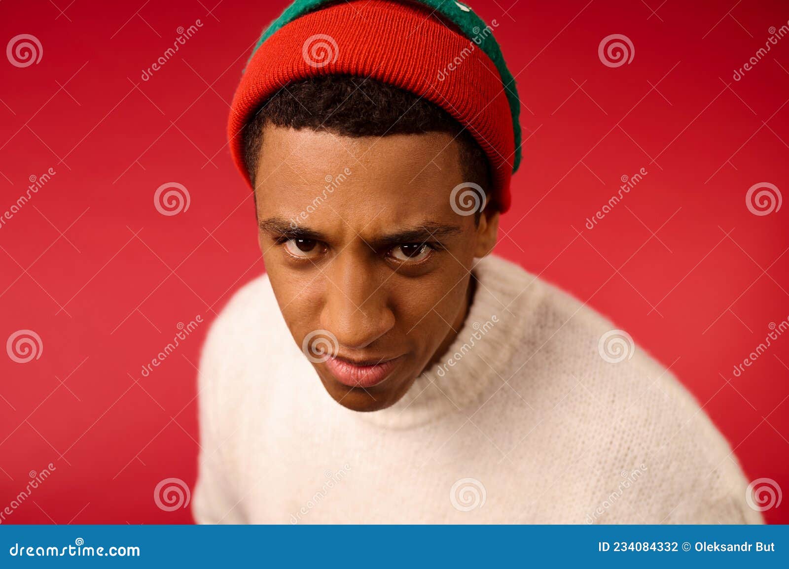 A Close Up Picture of a Young Man in Red Hat Stock Photo Image of