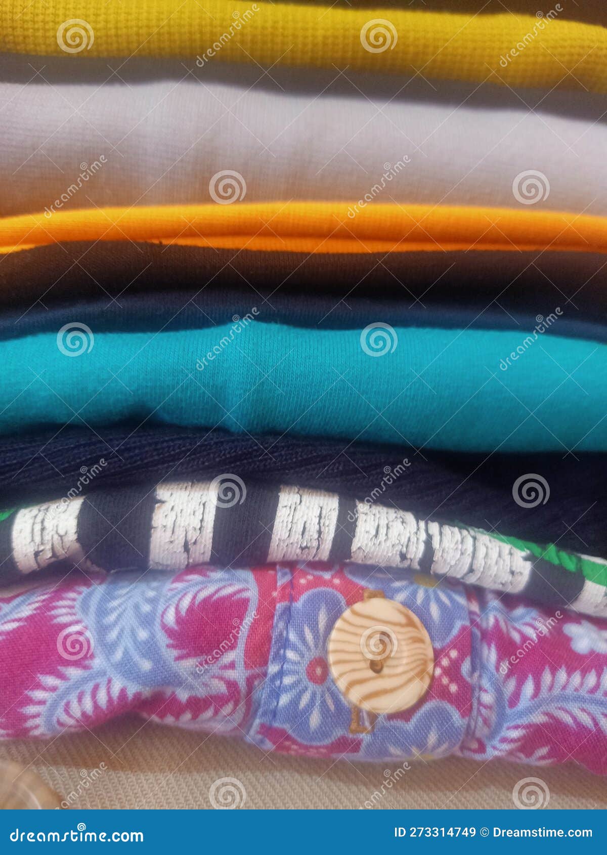 Close Up of a Pile of Assorted Ironed and Folded Clothes Stock Image