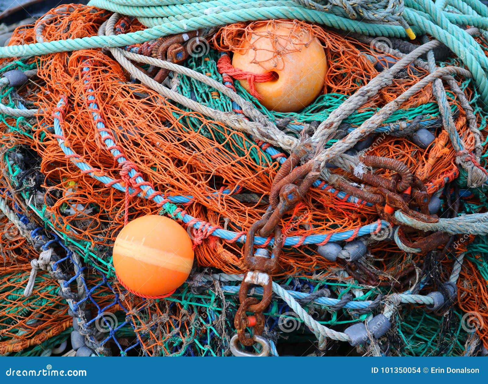 Close Up Pile of Colorful Fish Nets and Buoys Stock Photo - Image