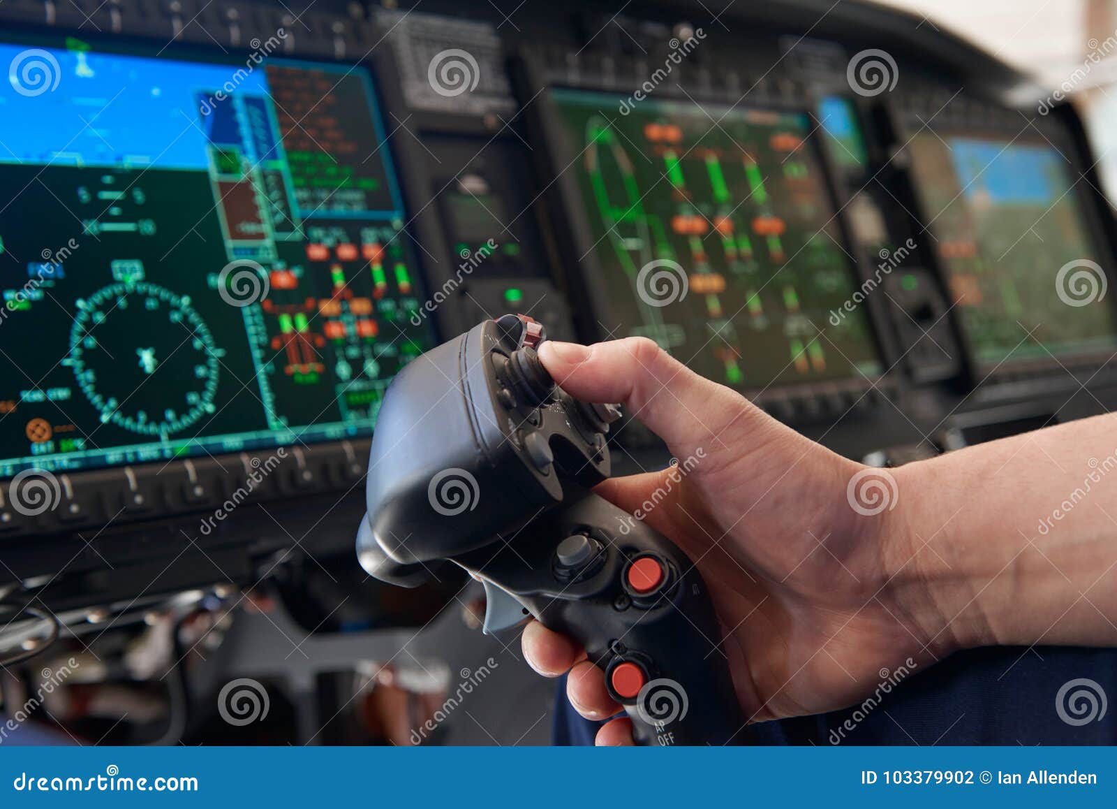 Close Up Pilot Holding Joystick in Helicopter Cockpit Stock Photo