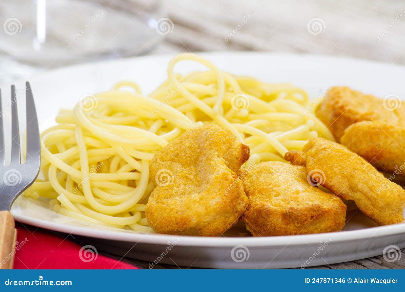 A Plate of Spaghetti with Chicken Nuggets Stock Photo Image of