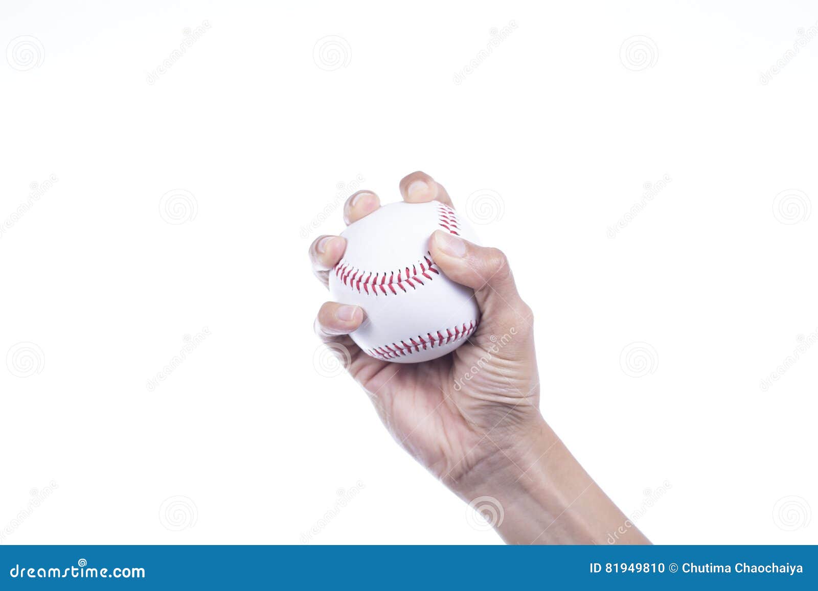 close-up of player`s hand holding baseball