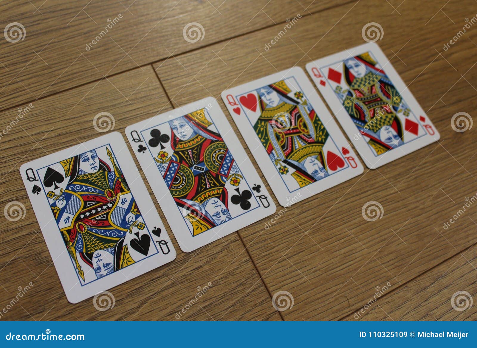 Poker Cards On A Wooden Backround, Set Of Queens Of Clubs 