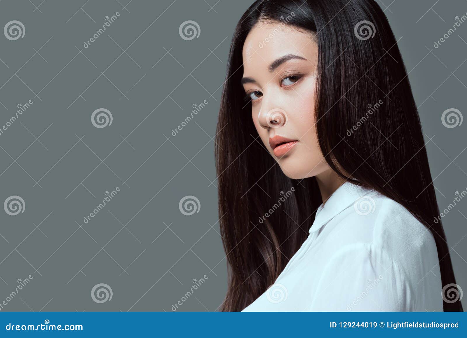 Close-up Portrait of Beautiful Asian Girl Looking at Camera Stock Image ...