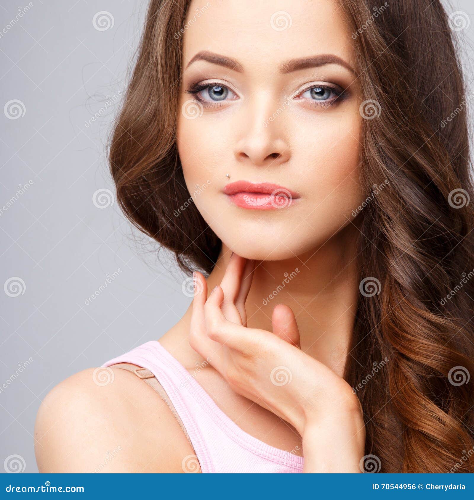 IMG - Close-up portrait of beautiful young woman with 
