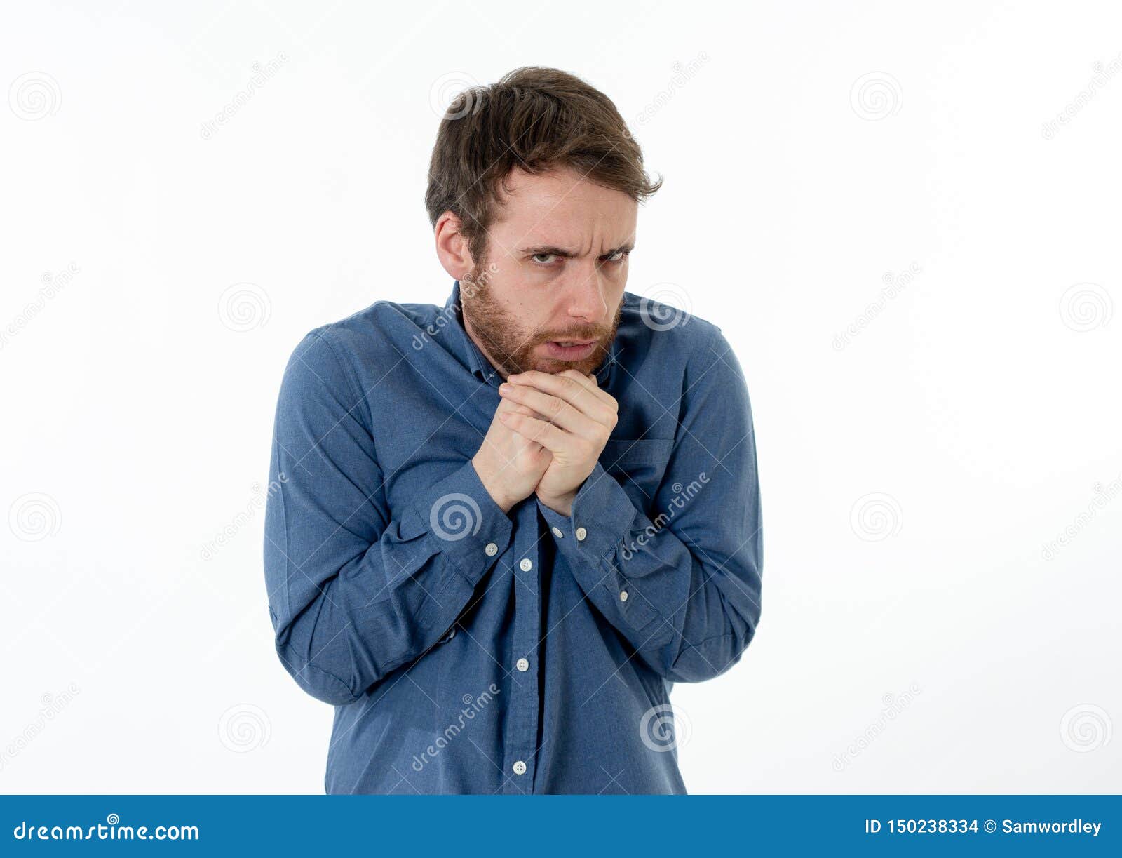 Portrait Of Young Man In Shock With A Scared Face Expression