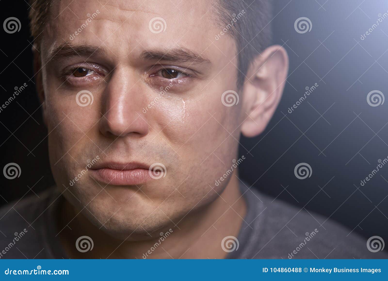 Close Up Portrait of Crying Young White Man Looking Away Stock Photo ...