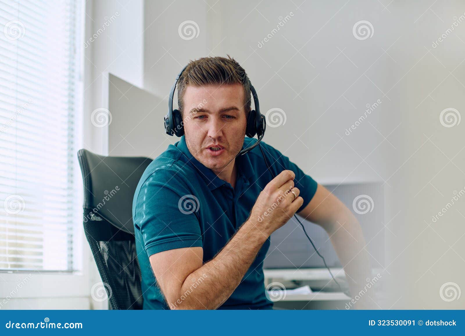 close up portrait of a customer support representative in a call center environment.