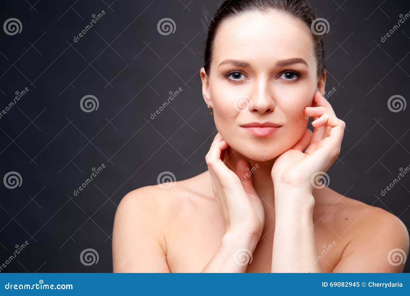 Close Up Portrait Of Elegant Brunette Woman With Nude Make Up Stock