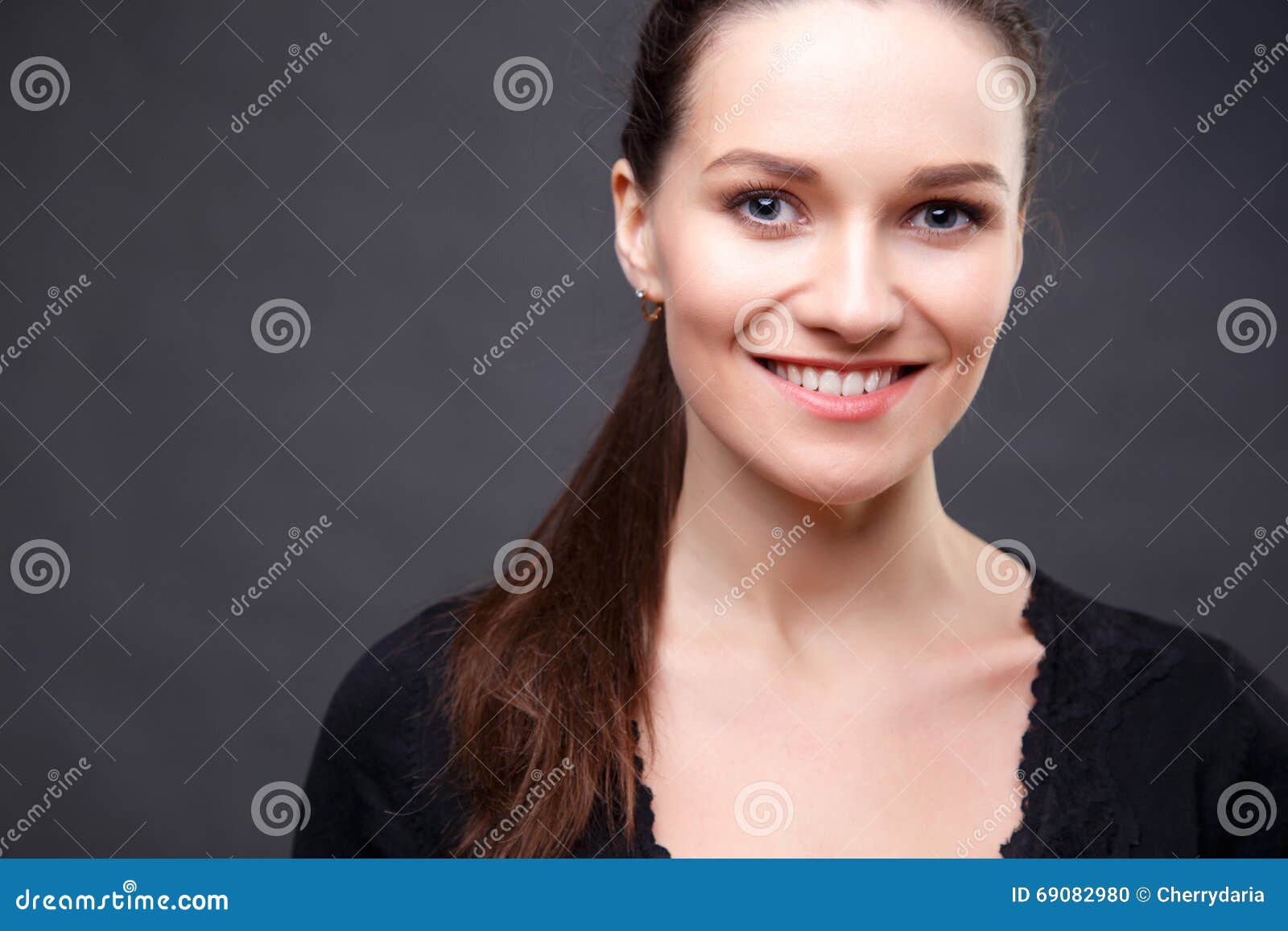 Close Up Portrait Of Elegant Brunette Woman With Nude Make Up Stock