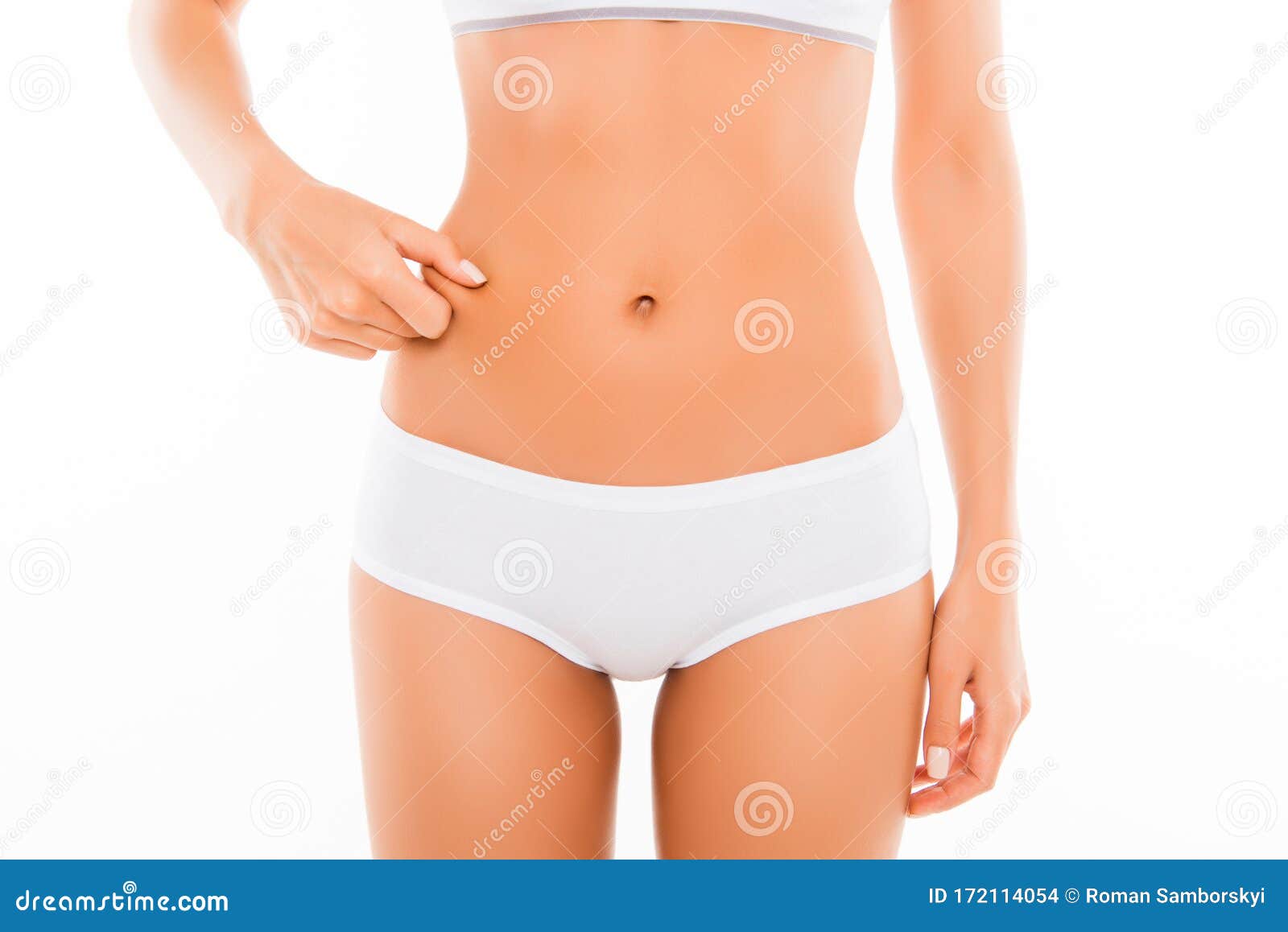 Close Up Of Woman In Underwear Holding Stomach In Pain Stock Photo by  ©HighwayStarz 65711145