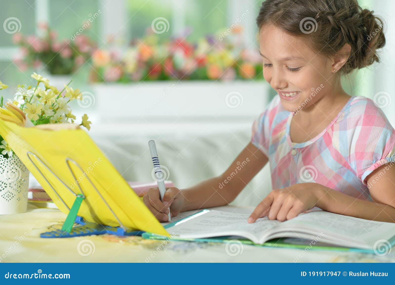 Portrait Of Cute Little Girl Doing Homework Stock Image 