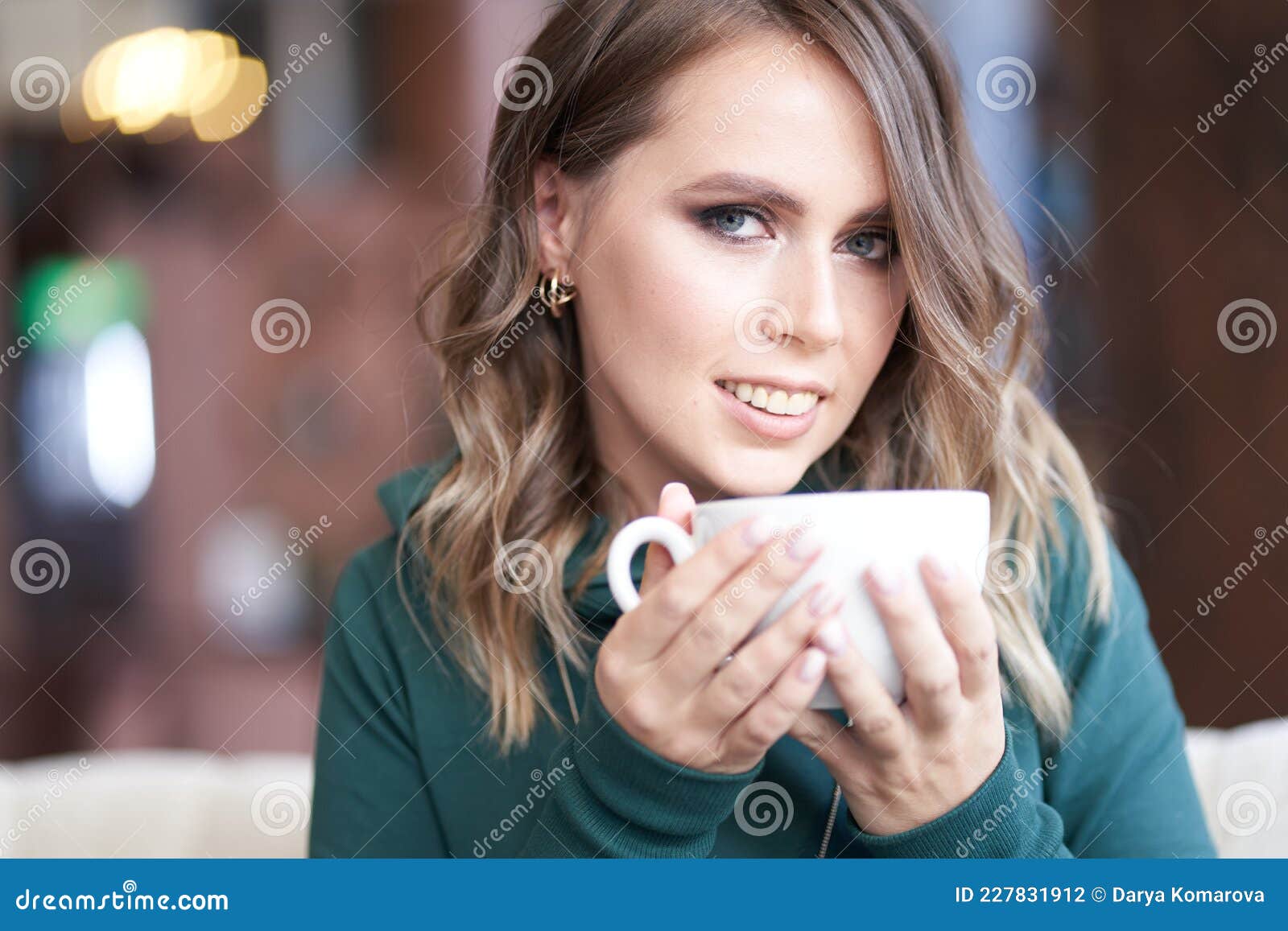 Close-up Portrait of an Optimistic Beautiful Woman with a Beautiful ...