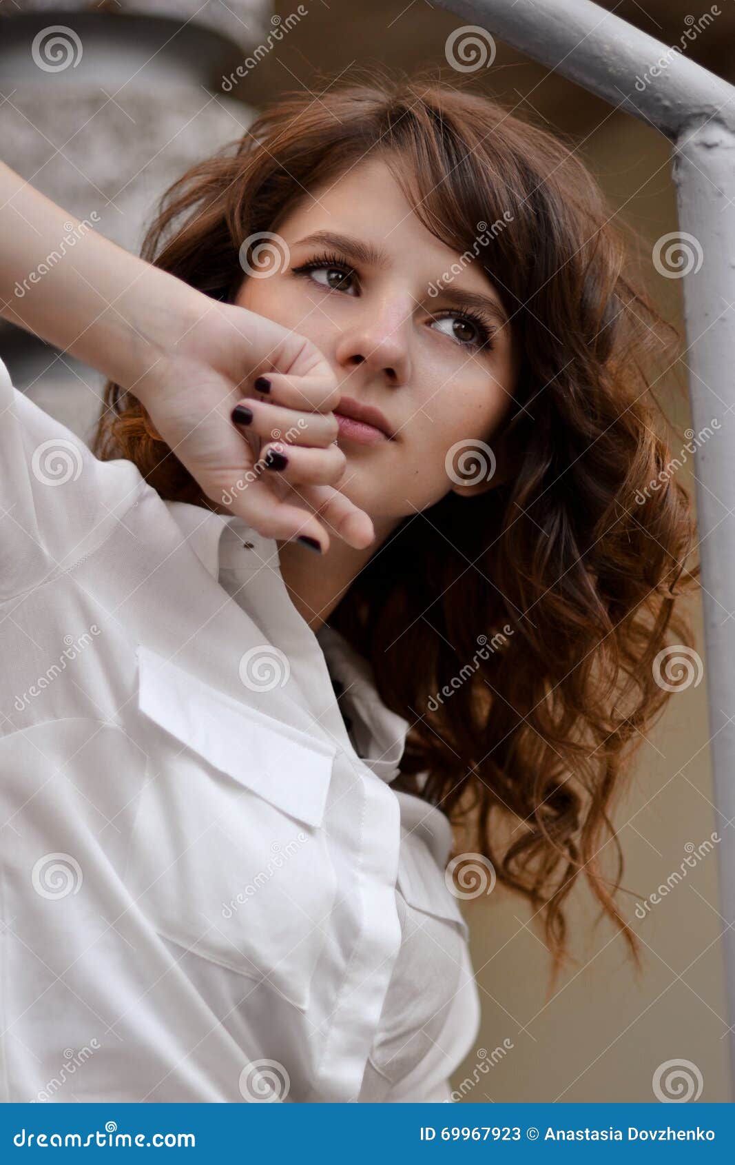 Red Haired Little Cute Girl With Brown Eyes In White Blouse