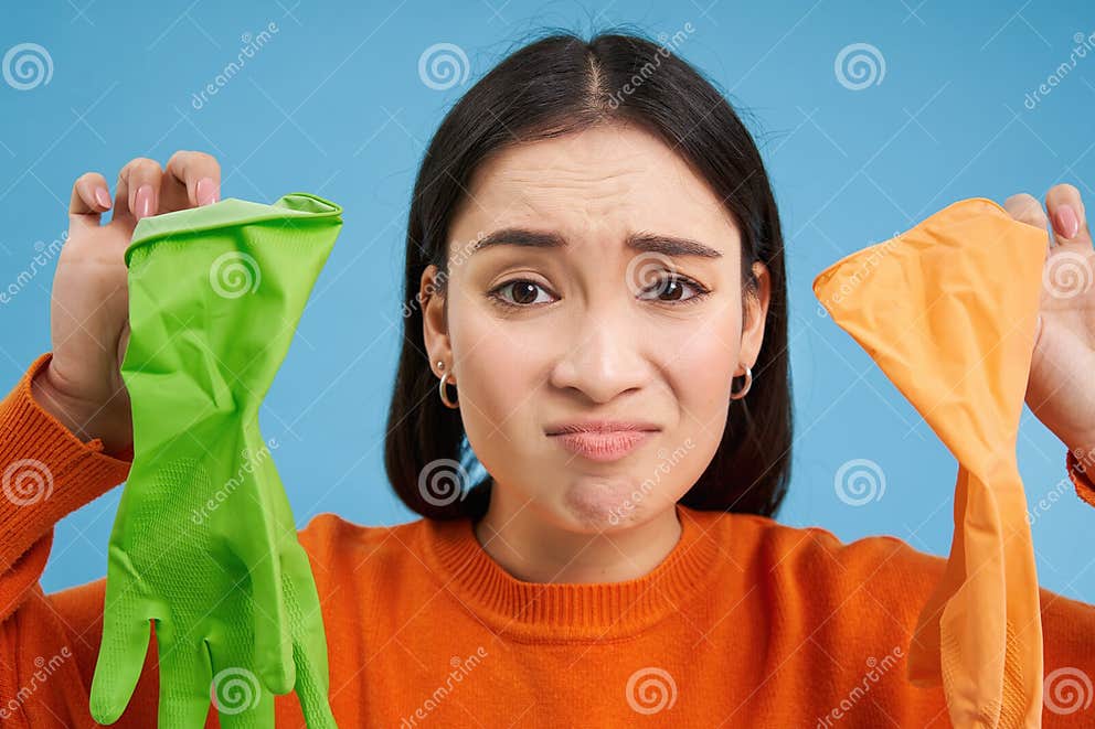 Close Up Portrait of Reluctant Young Woman, Showing Two Different Latex ...