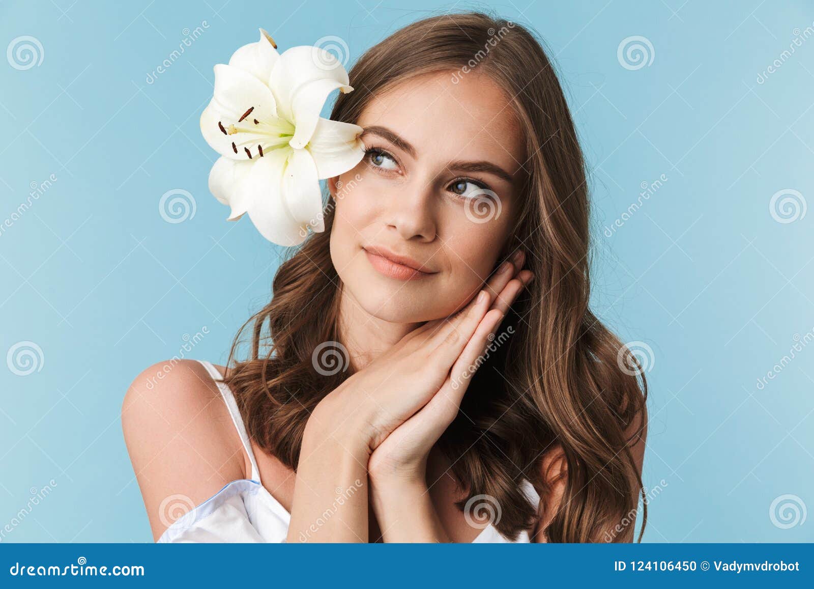 Portrait of a smiling young woman washing dishes Stock Photo by vadymvdrobot