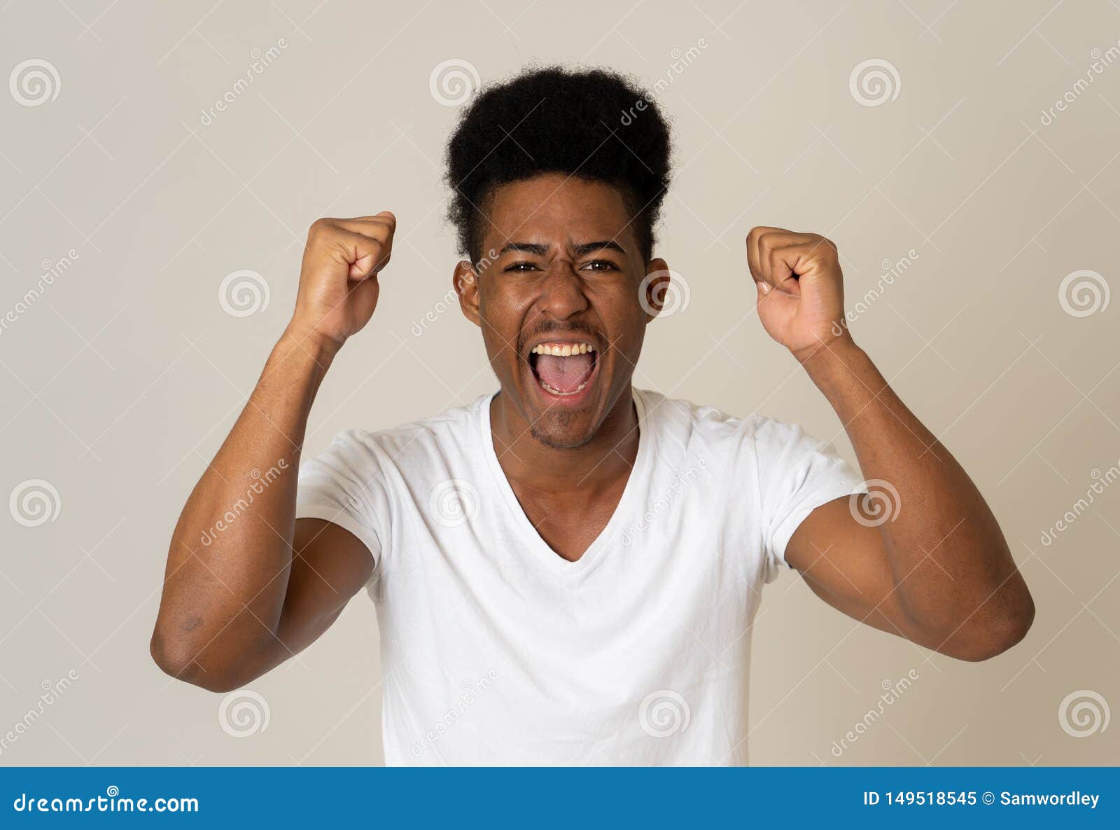 close up portrait of surprised and happy man celebrating victory and wining team or lottery