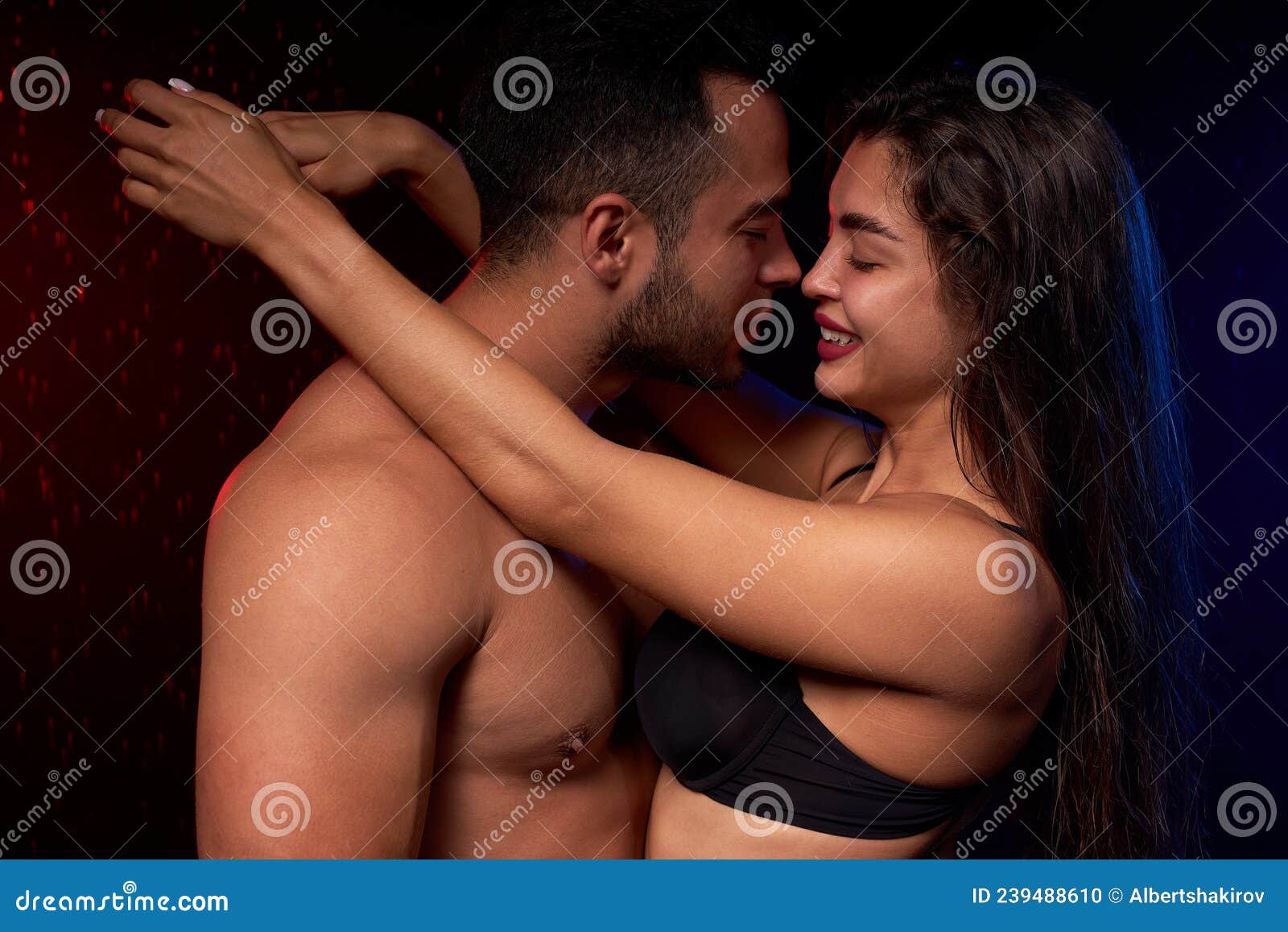 Close-up Portrait of Wet Temptive Man and Woman with Naked Fitness Body Hugging Stock Photo