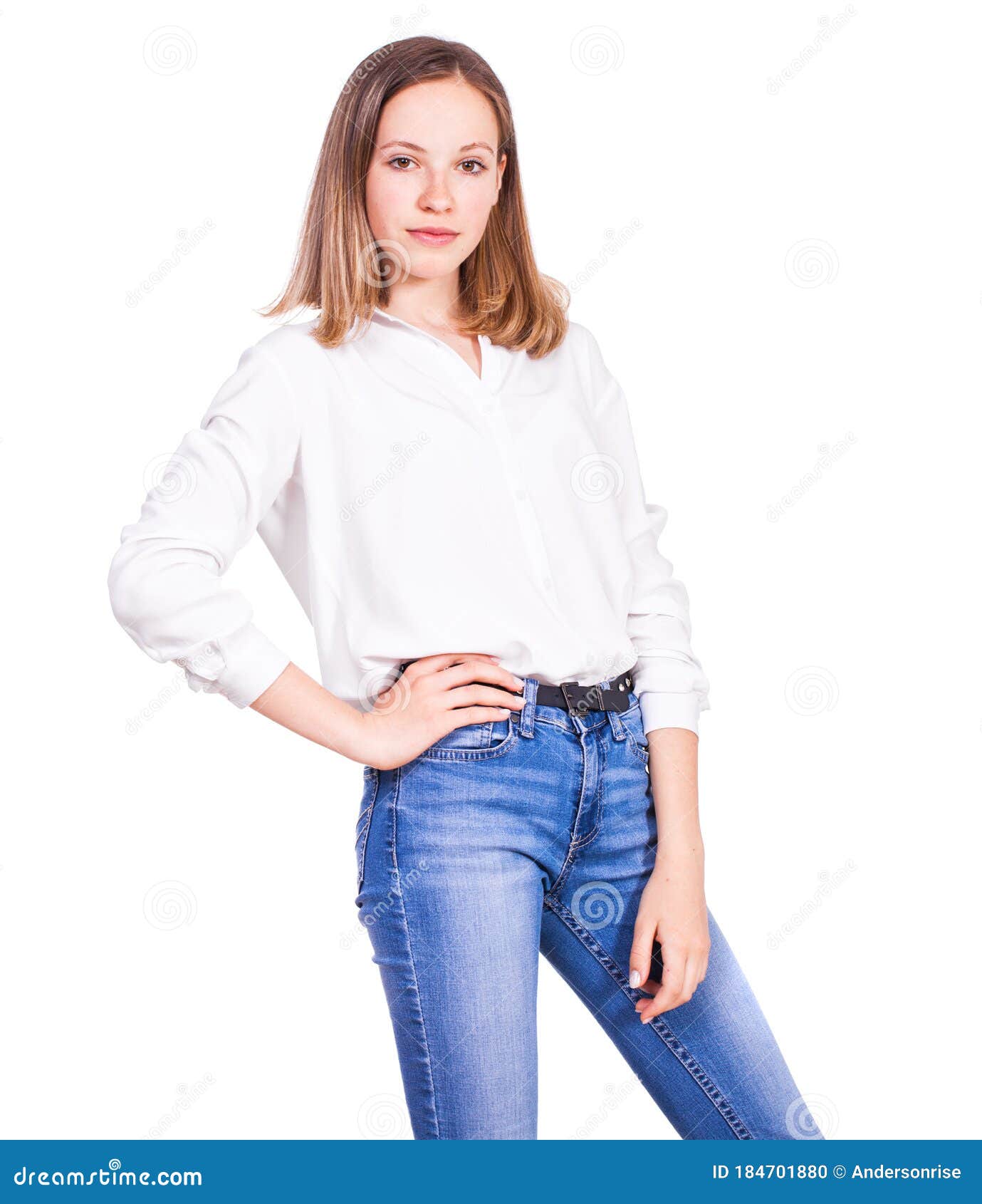 Portrait of a Young Beautiful Blonde Model in Blue Jeans and White ...