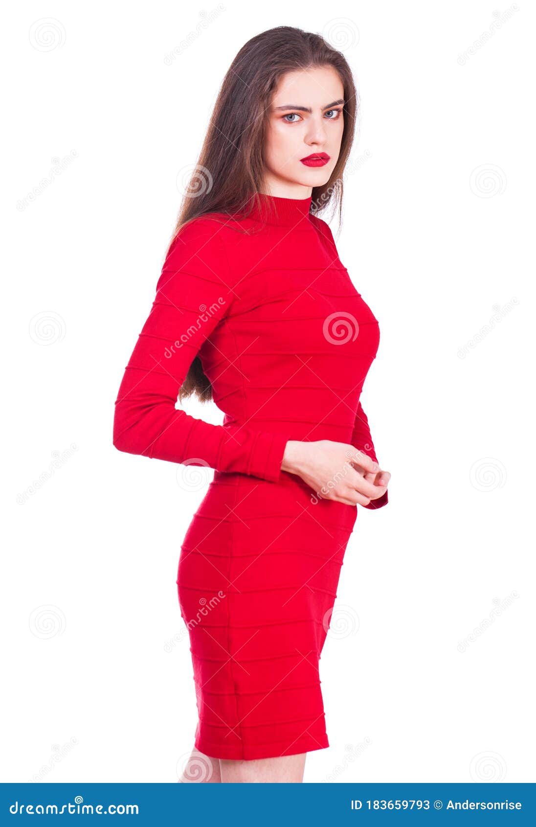 Portrait Of Beautiful Young Woman Of Red Dress Posing In 