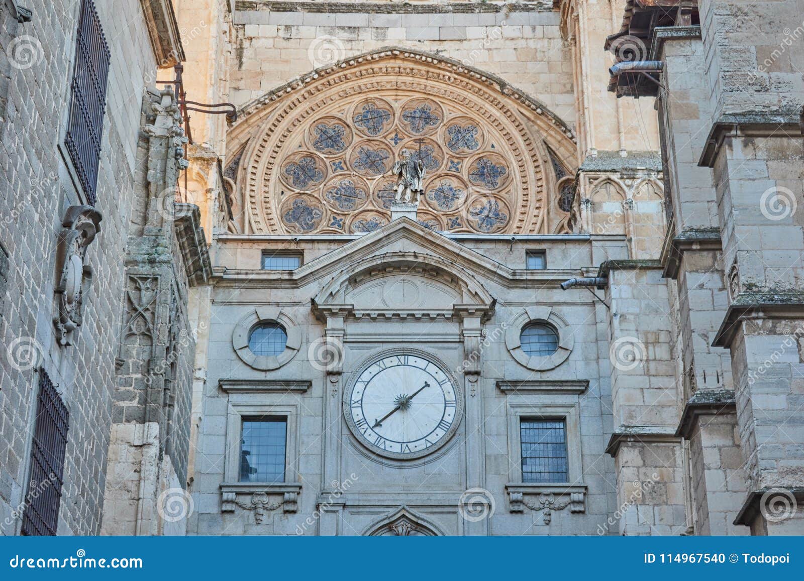 close-up of the primate cathedral of saint of mary of toledo and his clock / catedral primada santa maria de toledo y su reloj. to