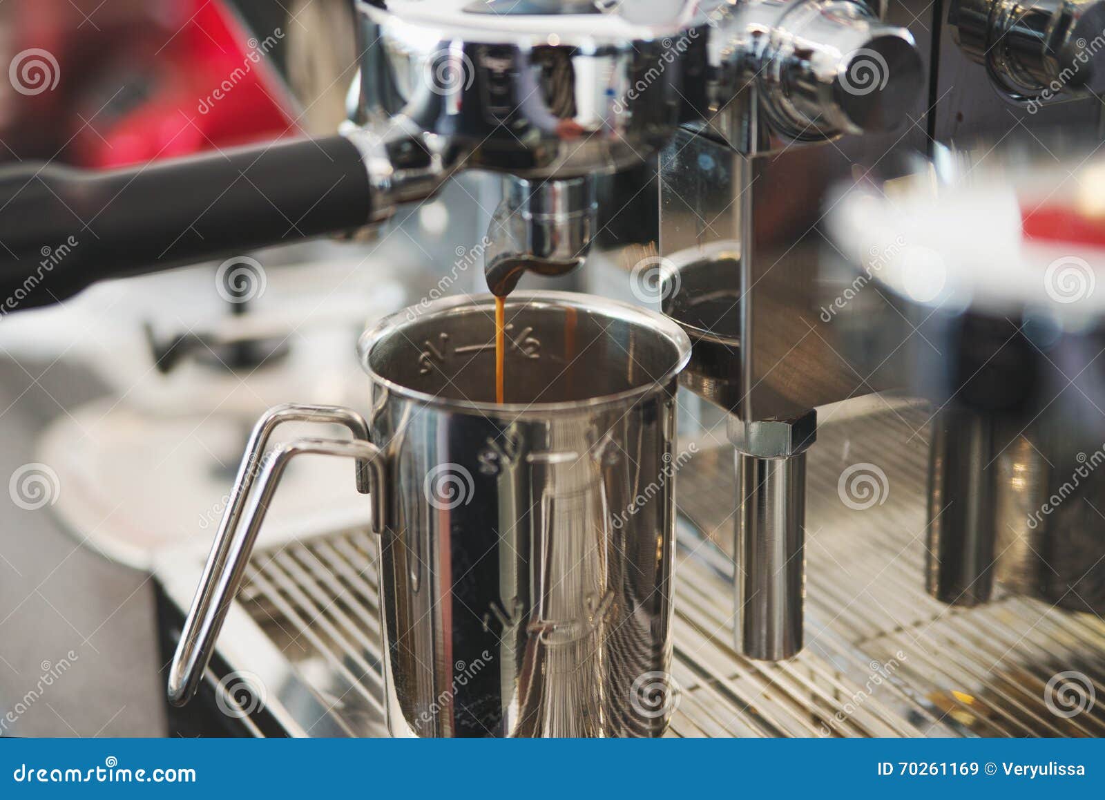 Closeup of an Professionel Coffee Machine Making a Cup of Coffe Stock