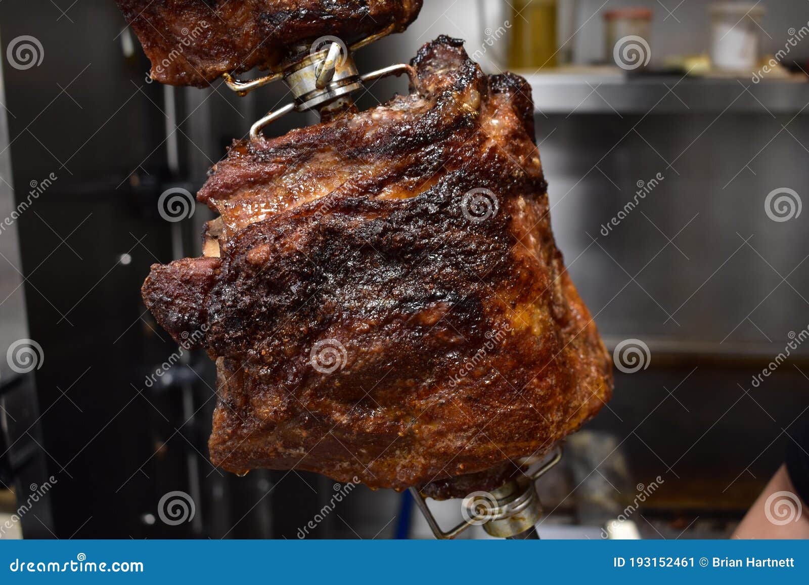 A Close Up of a Rack of Ribs Inside a Rotisserie Stock Image Image of
