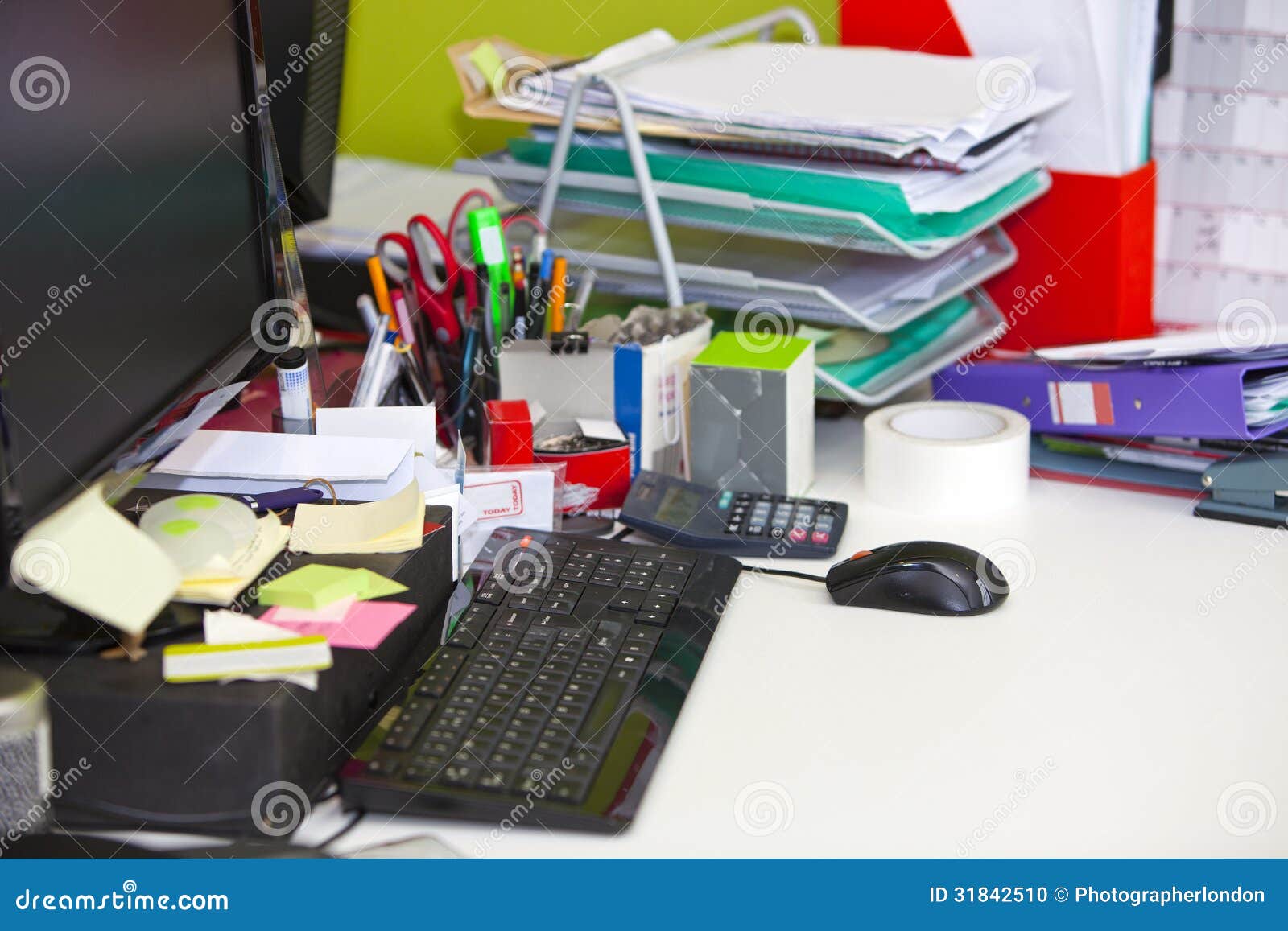 close-up of real life messy desk in office