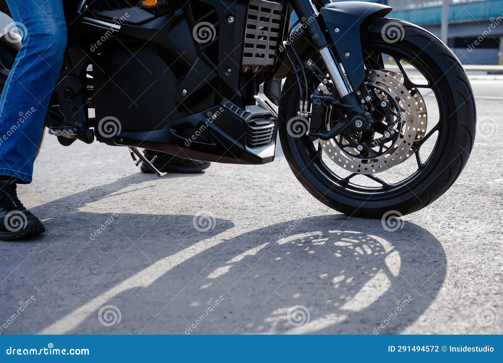 Closeup of the Rear Wheel with the Engine of an Electric Motorcycle