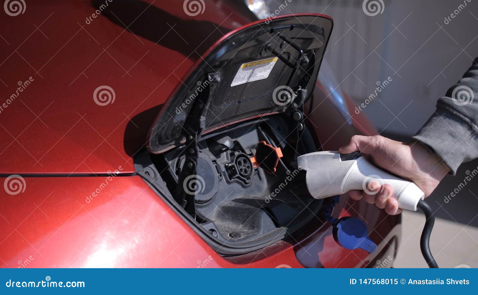 Male Hand Unplugging Electric Car Charging Cord Stock Video Video of