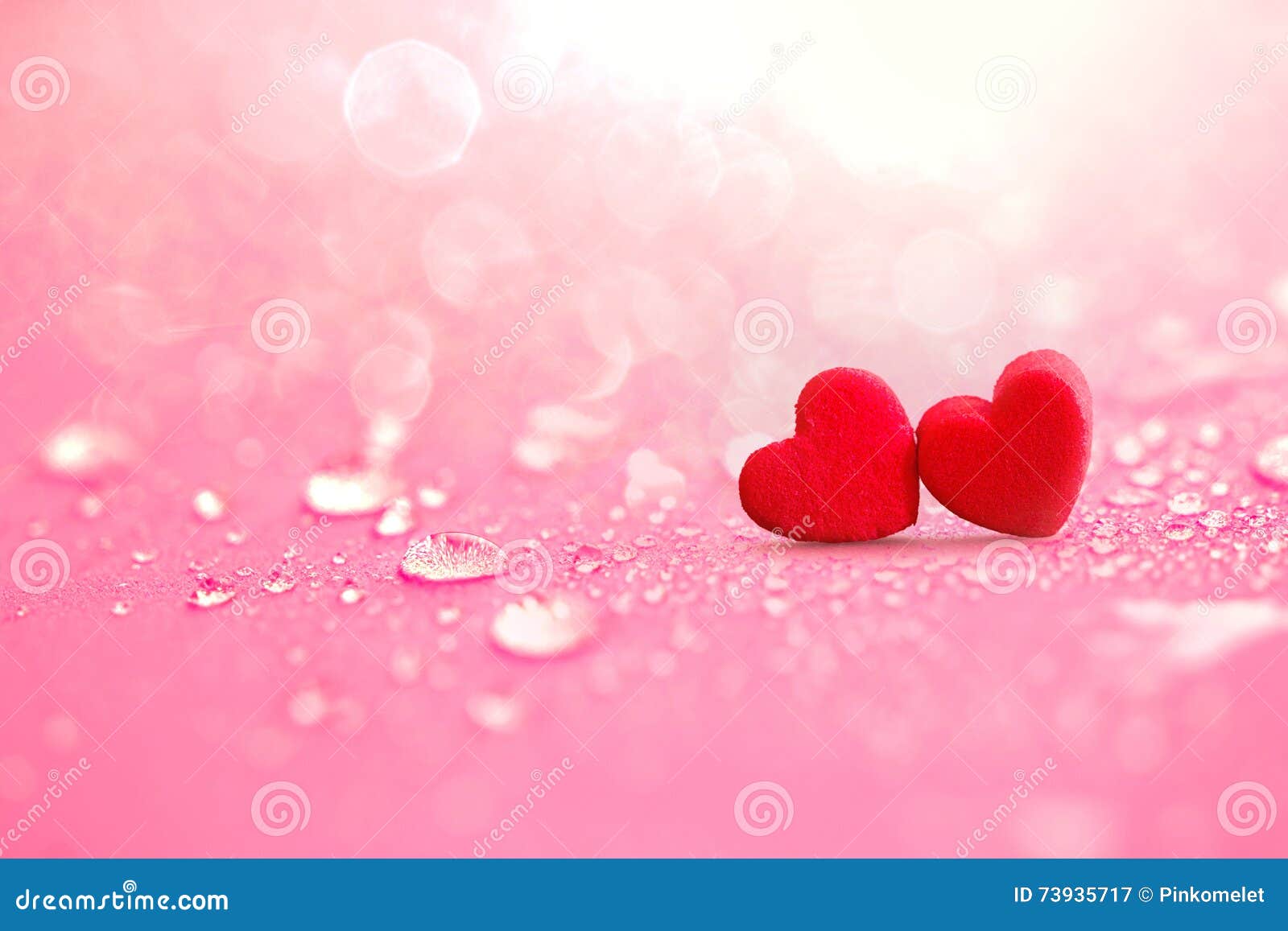 close up the red heart s with rain water drops on pink sponge surface as love romance abstract background