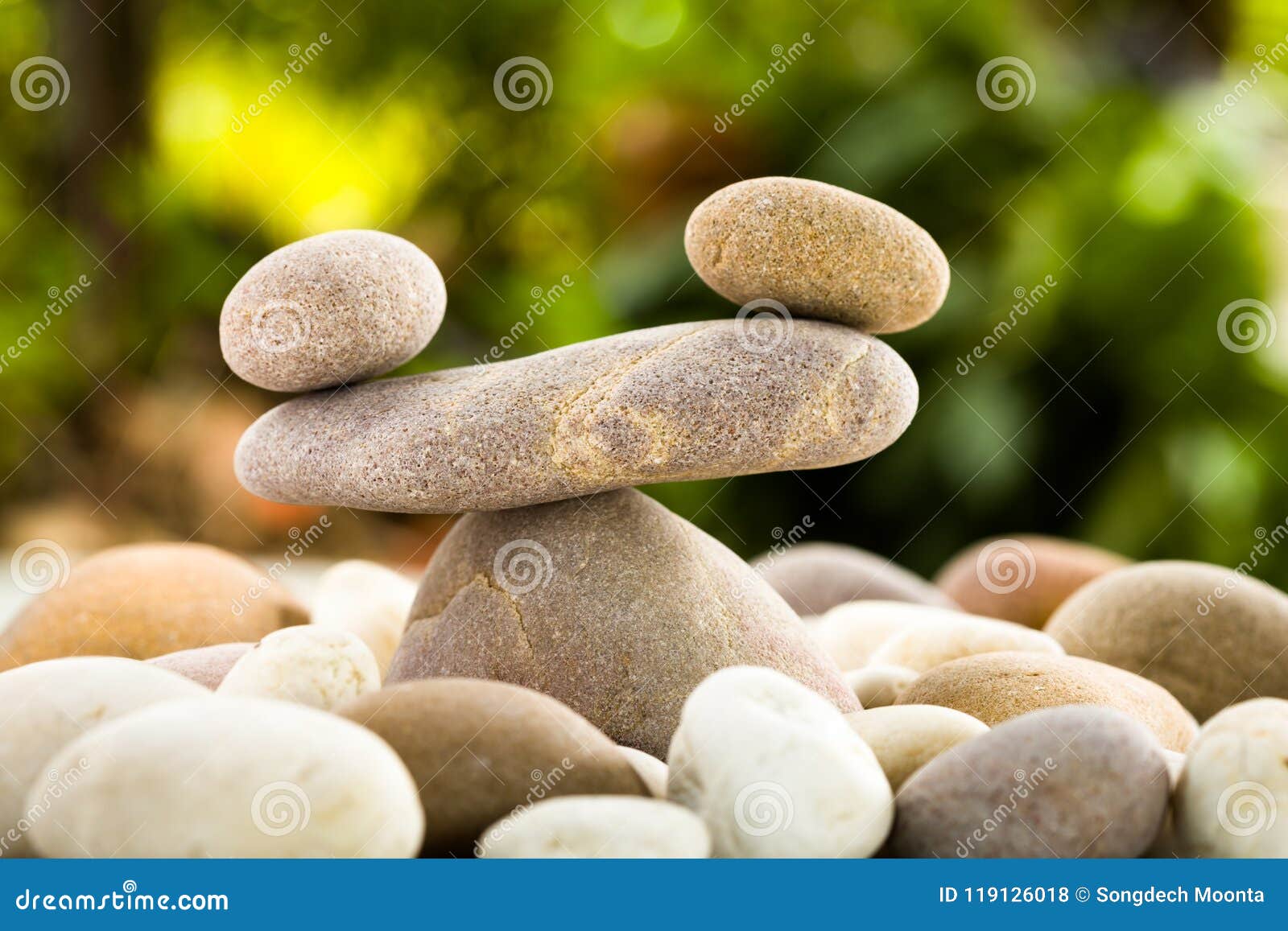 zen stacked stones on nature background