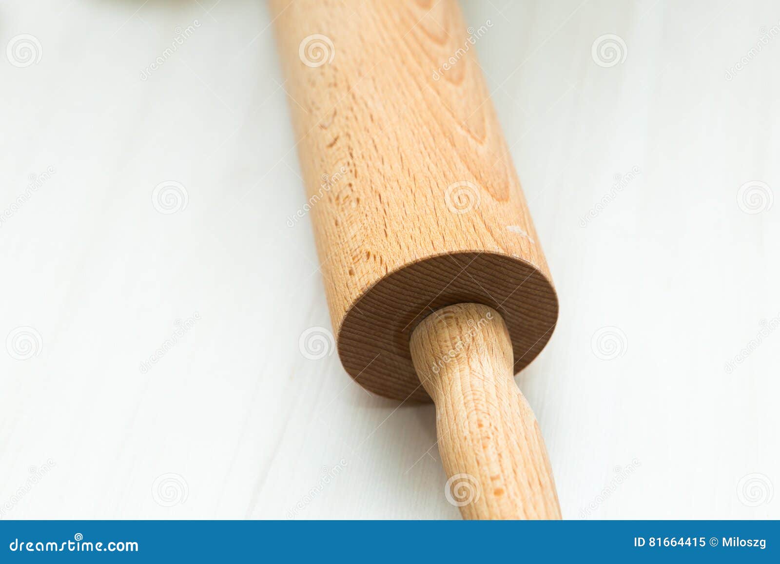 Close Up of Rolling Pin Lying on Wooden Table Stock Image Image of
