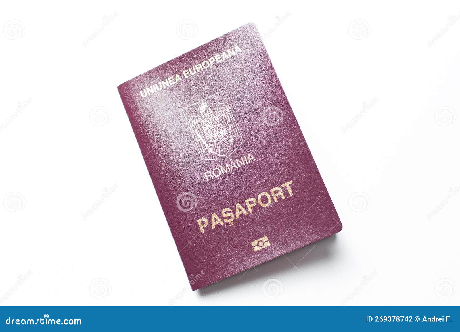 Closeup of Romanian Passport Isolated on White Background. Stock Photo