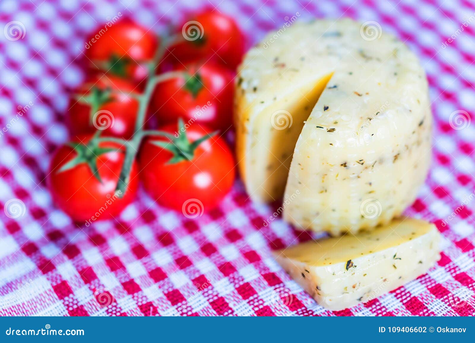 rustic cheese with herbs and tomatoes