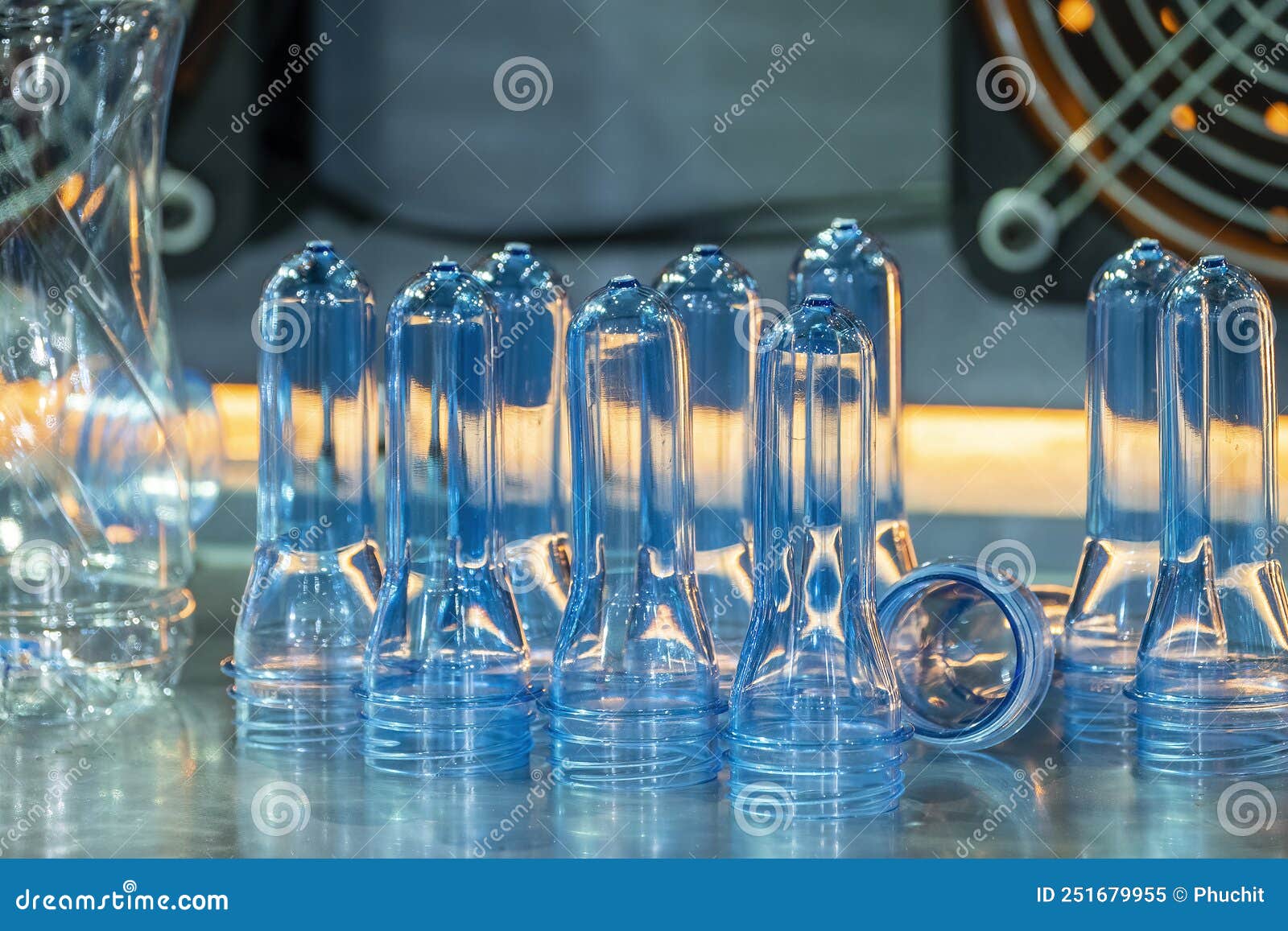 The Close Up Scene of Group of Preform Shape of PET Bottle Products