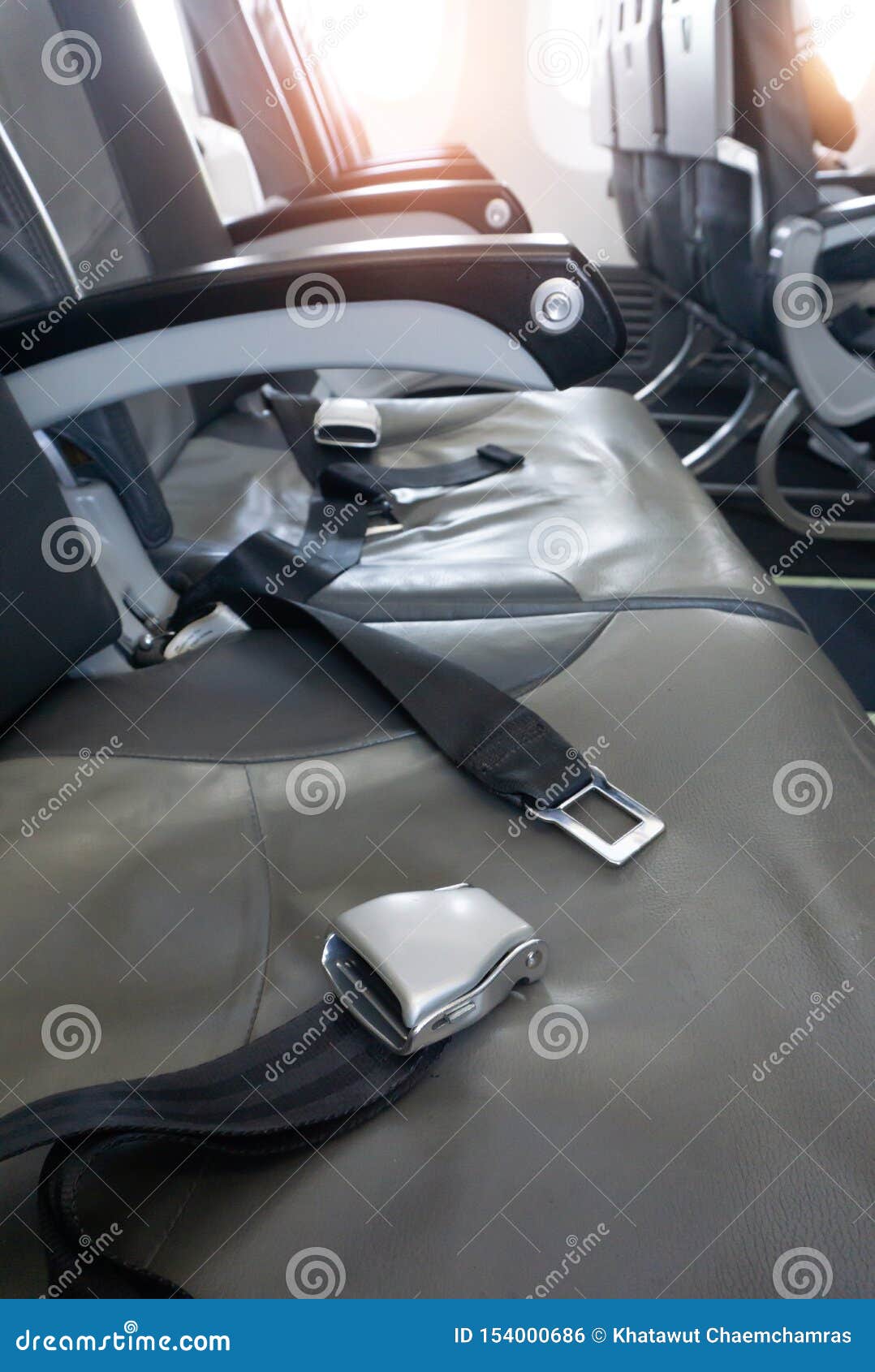 Close-Up of Seat Belt on Seat in Airplane Stock Photo - Image of ...