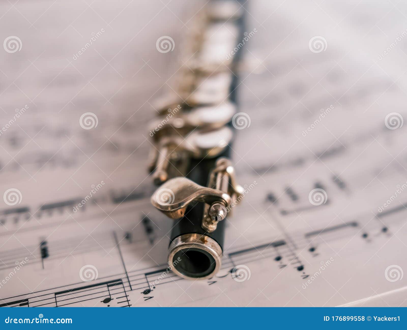 Close Up of Wooden Flute on Unidentifiable Sheet Music Stock Photo - Image  of piccolo, keys: 176899558