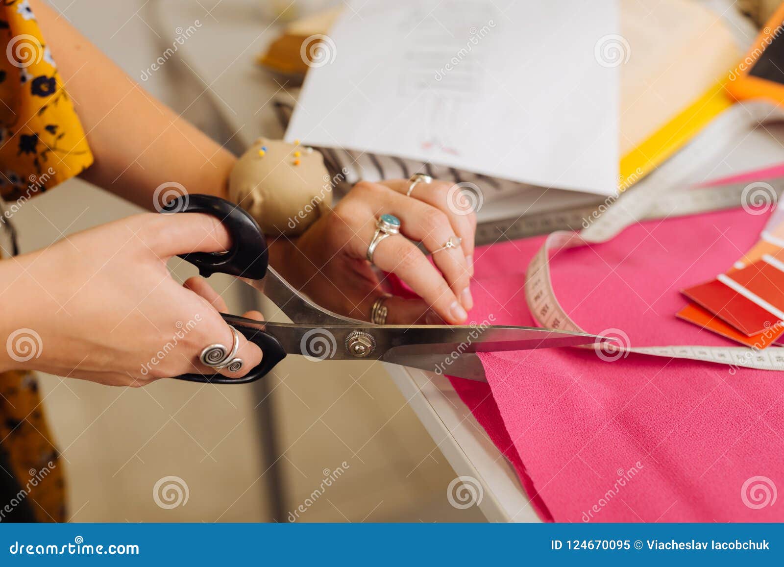 Close Up of Sharp Scissors in the Hands of Experienced Dressmaker Stock