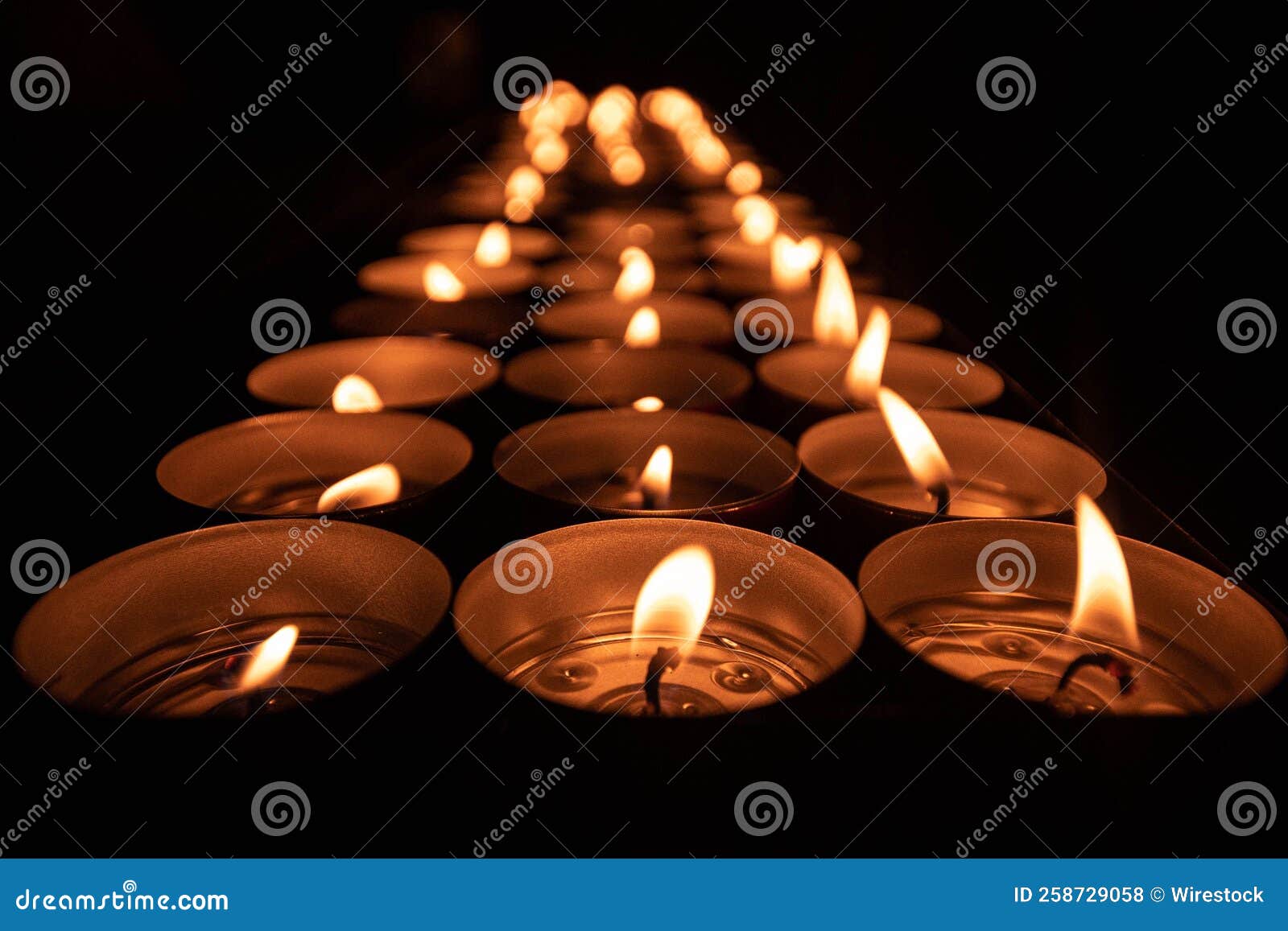 Closeup Shot of Burning Tea Candles in a Dark Stock Photo Image of