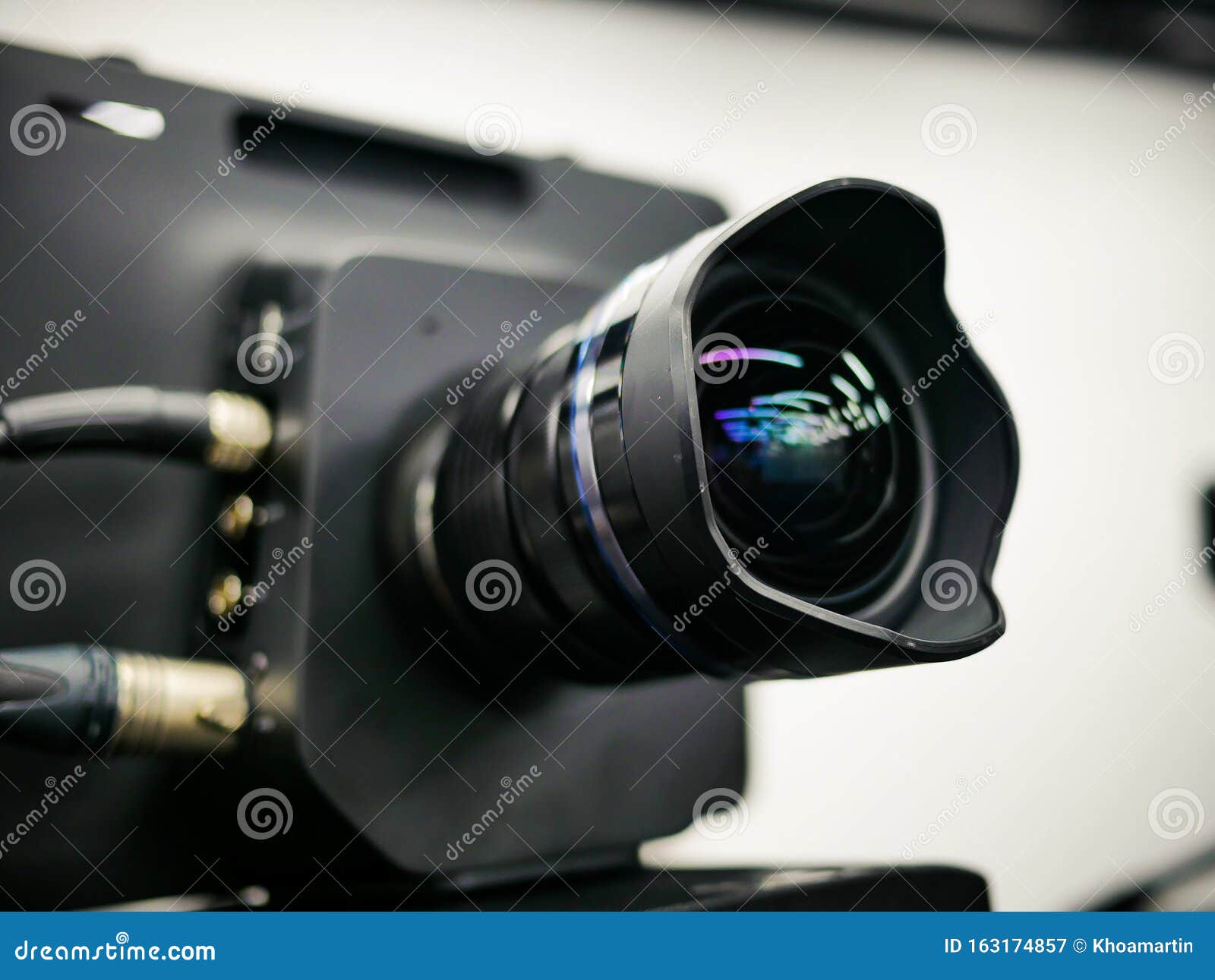 Close Up Shot of Camera Lens Set Up Filming in the Studio. Reflection