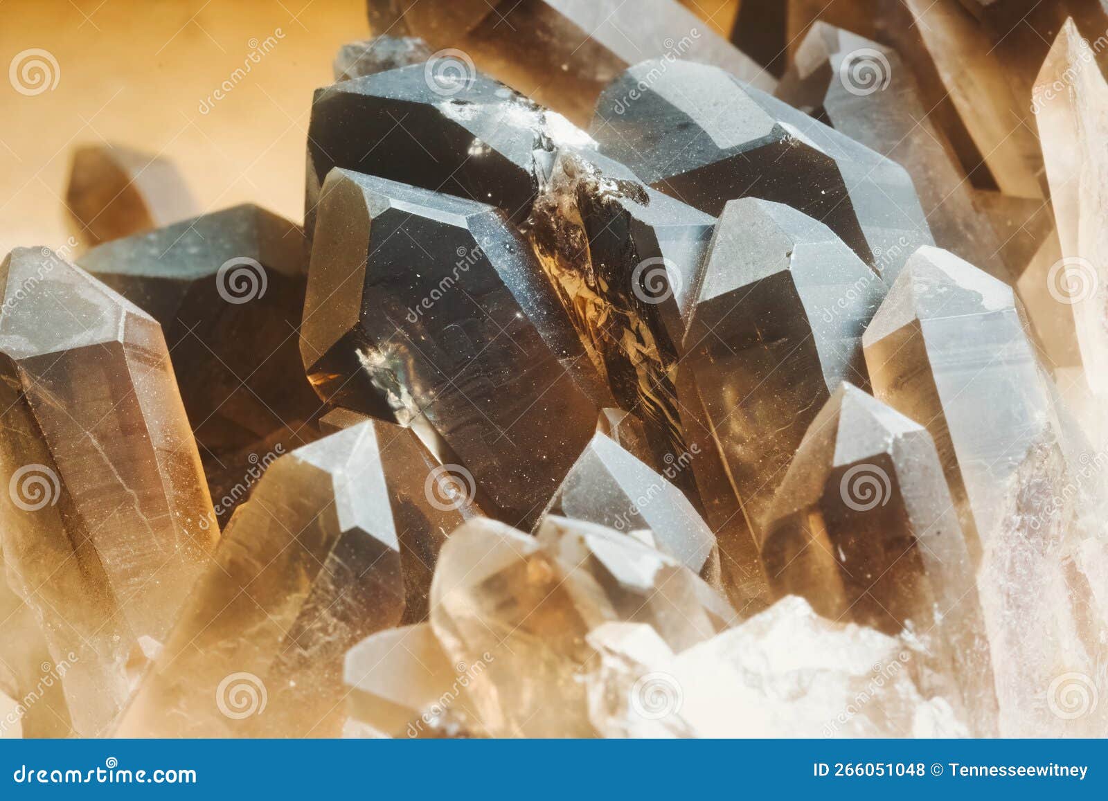 a close-up shot of a cluster of smokey quartz stones