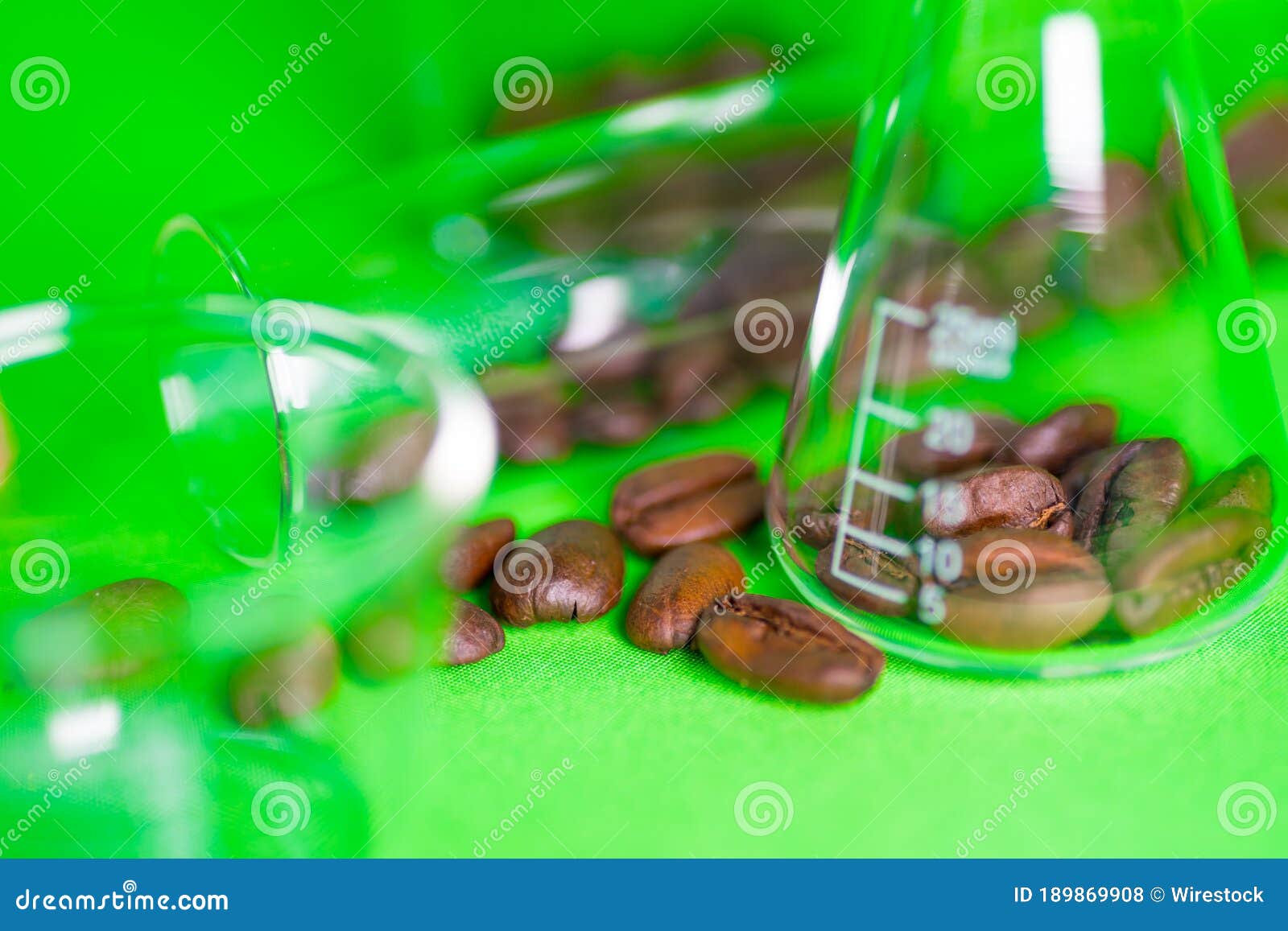 Close Up Shot of Coffee Beans in Laboratory Glassware Stock Photo
