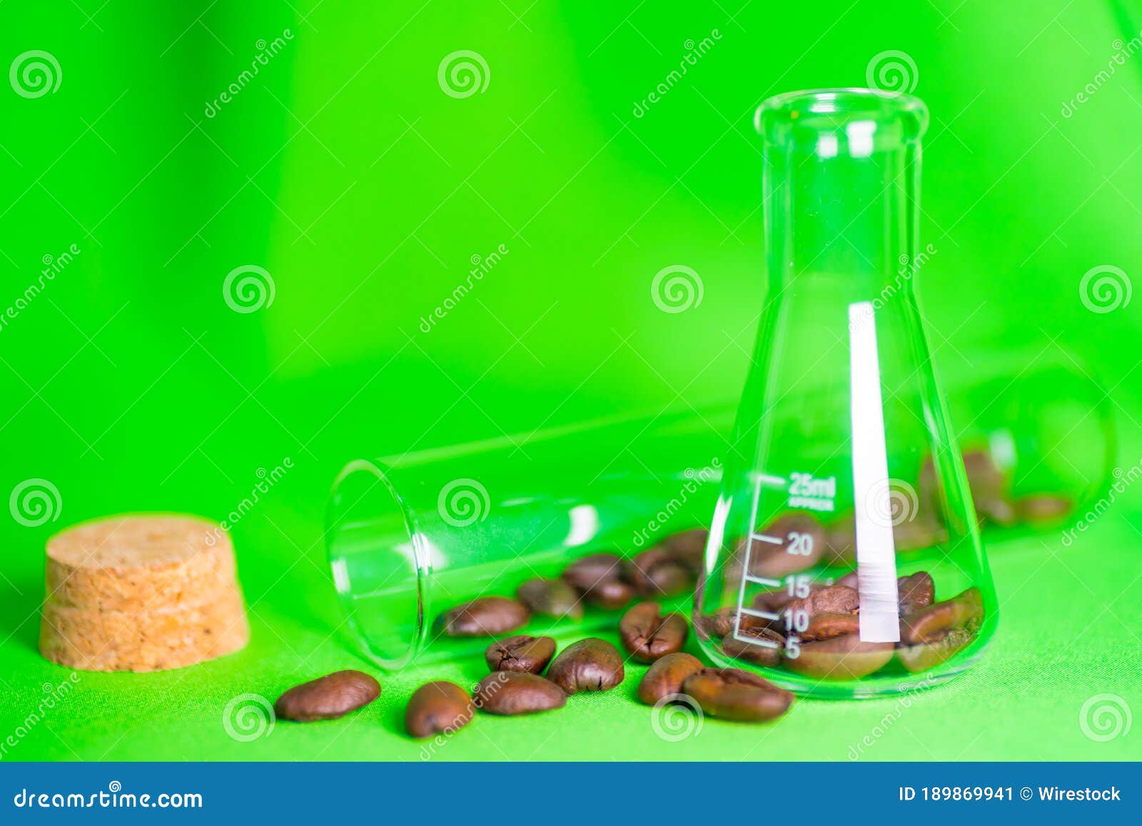 Close Up Shot of Coffee Beans in Laboratory Glassware Stock Image