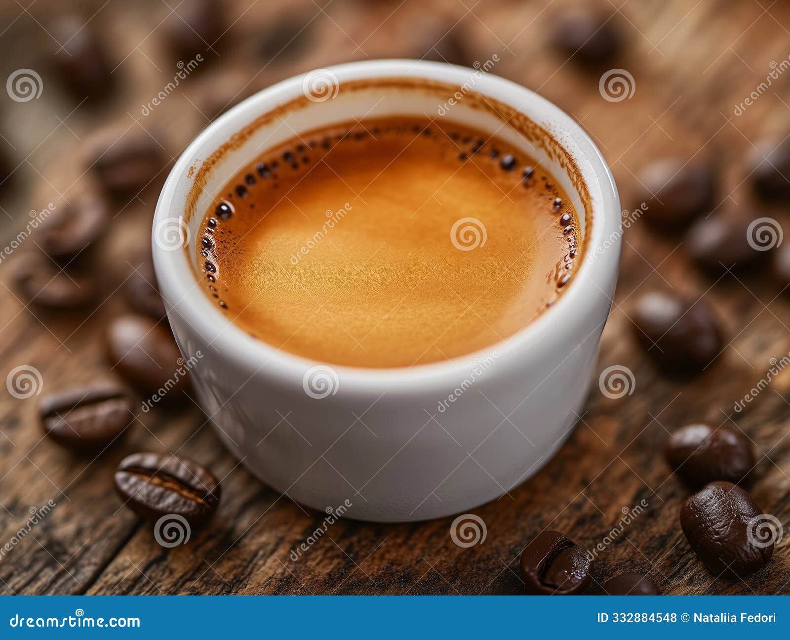 a close-up shot of a freshly brewed espresso in a small white cup