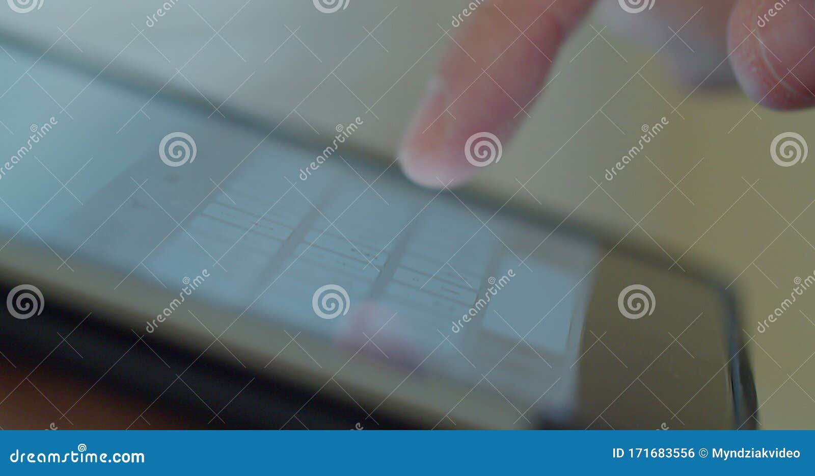 close-up shot of male hands in profile typing in messenger using tabletpc. hands typing text on tabletpc close-up.