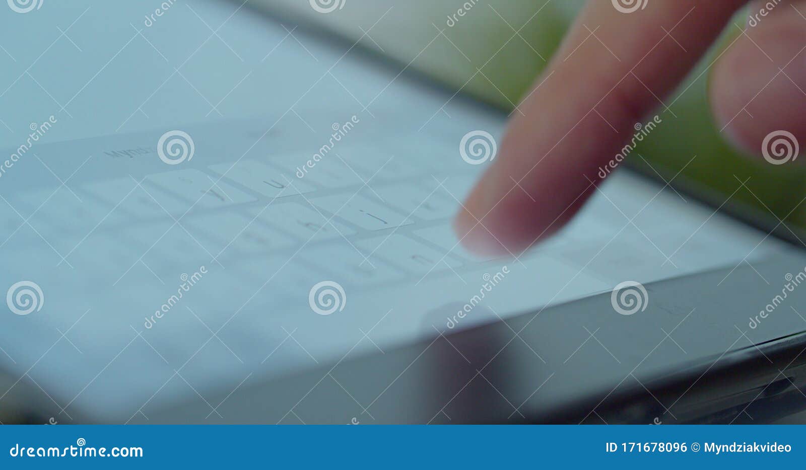 close-up shot of male hands in profile typing in messenger using tabletpc. hands typing text on tabletpc close-up.