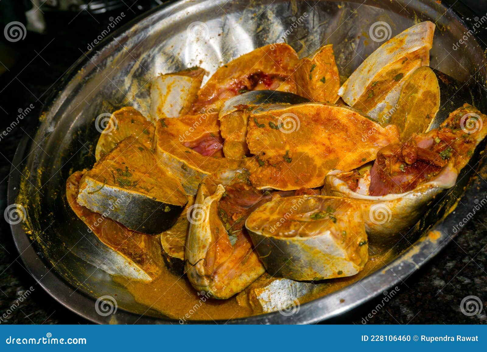 A Close Up Shot of Marinated Fish Pieces. it is Great Idea To Marinate